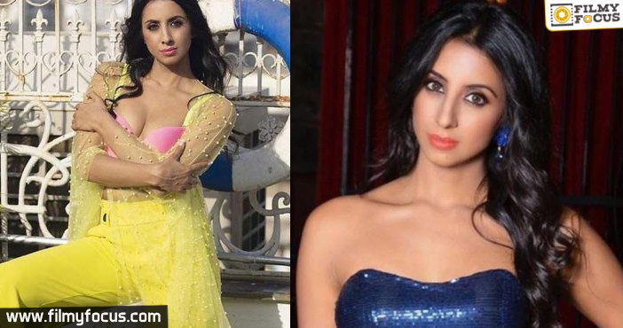 Sanjjanaa Galrani hits a producer with a bottle at a party1