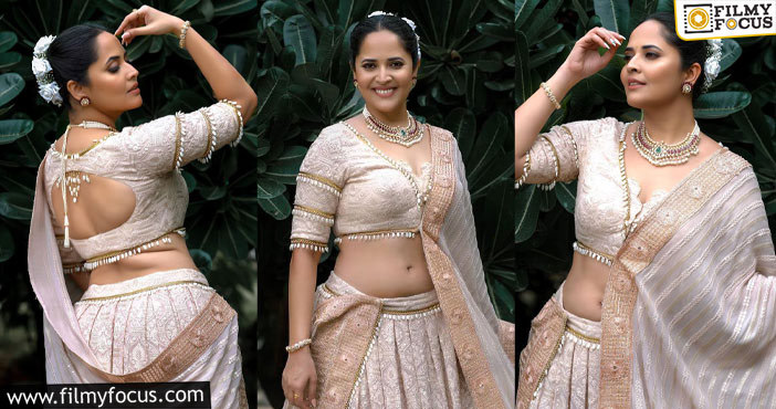 Anasuya: శారీలో నడుము అందాలు చూపిస్తూ అనసూయ గ్లామర్ షో.. వైరల్ అవుతున్న ఫోటోలు..!