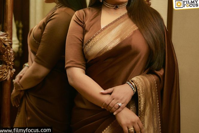 నేషనల్‌ బెస్ట్‌ హీరోయిన్‌ మెడలో ‘గొలుసు’ ఫొటో వైరల్‌.. అసలు కారణం ఇదీ!